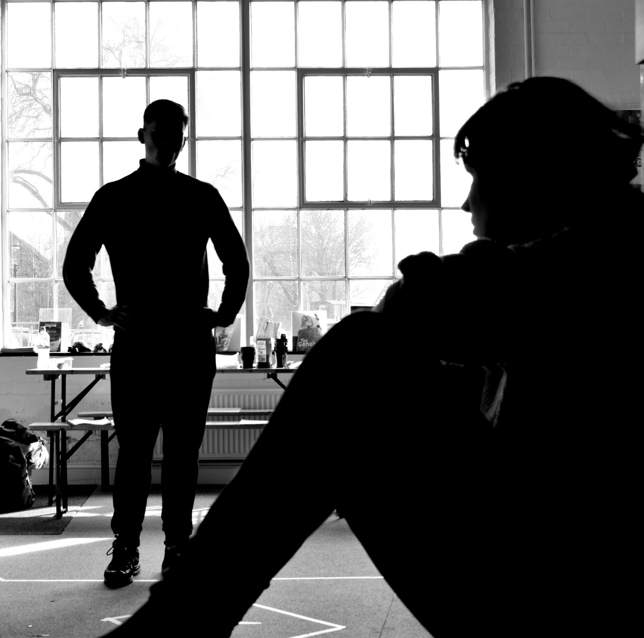 Actor in silhouette in rehearsal room