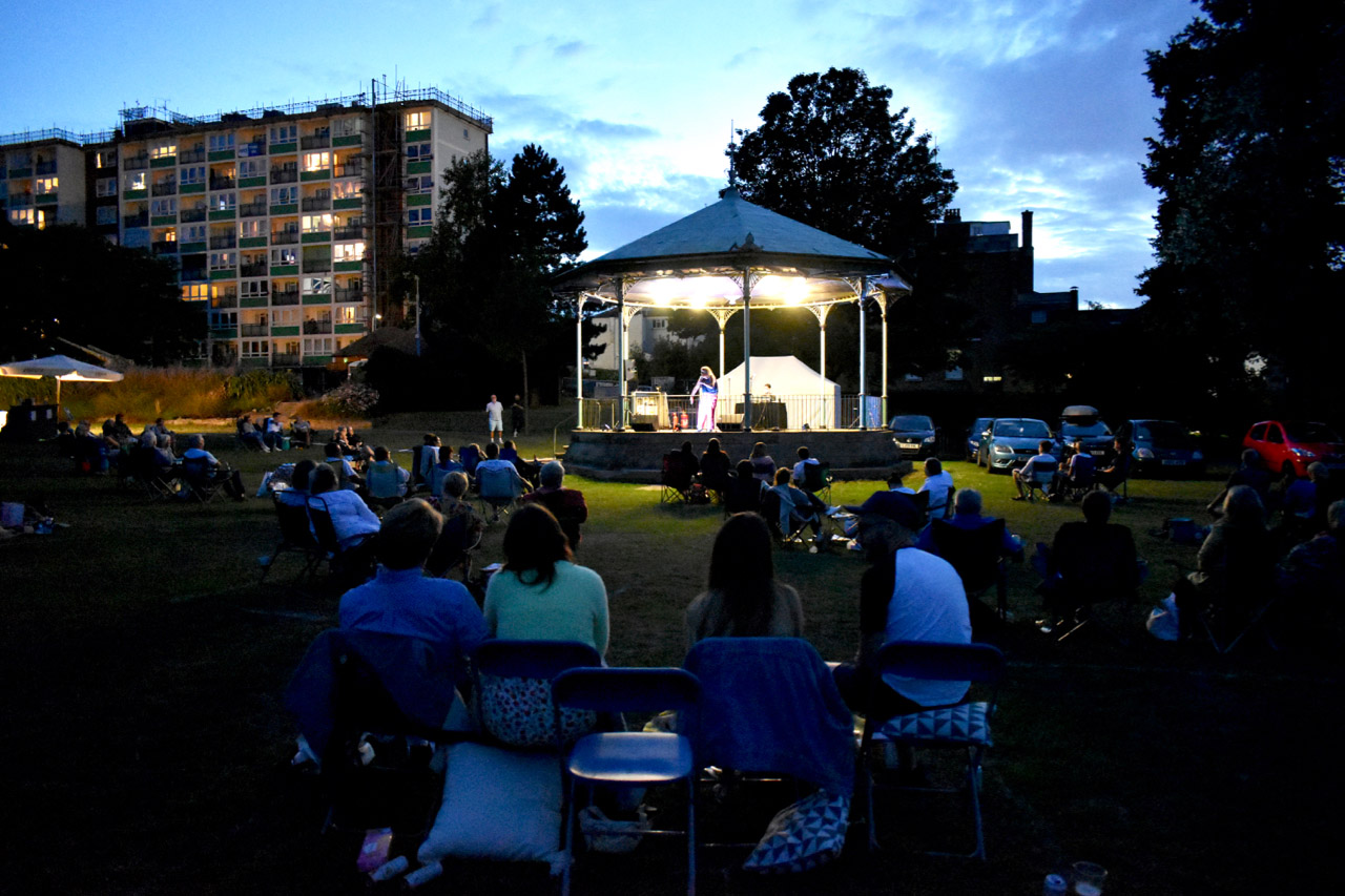 Full crowd at outdoor comedy event