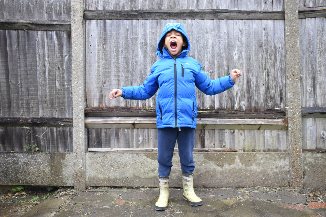 Young boy screaming/laughing