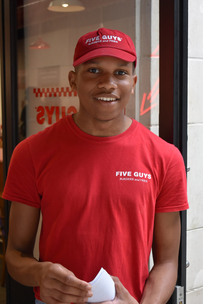 Man working at Five Guys