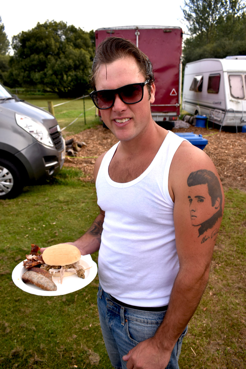 Man dressed as Elvis with tattoo