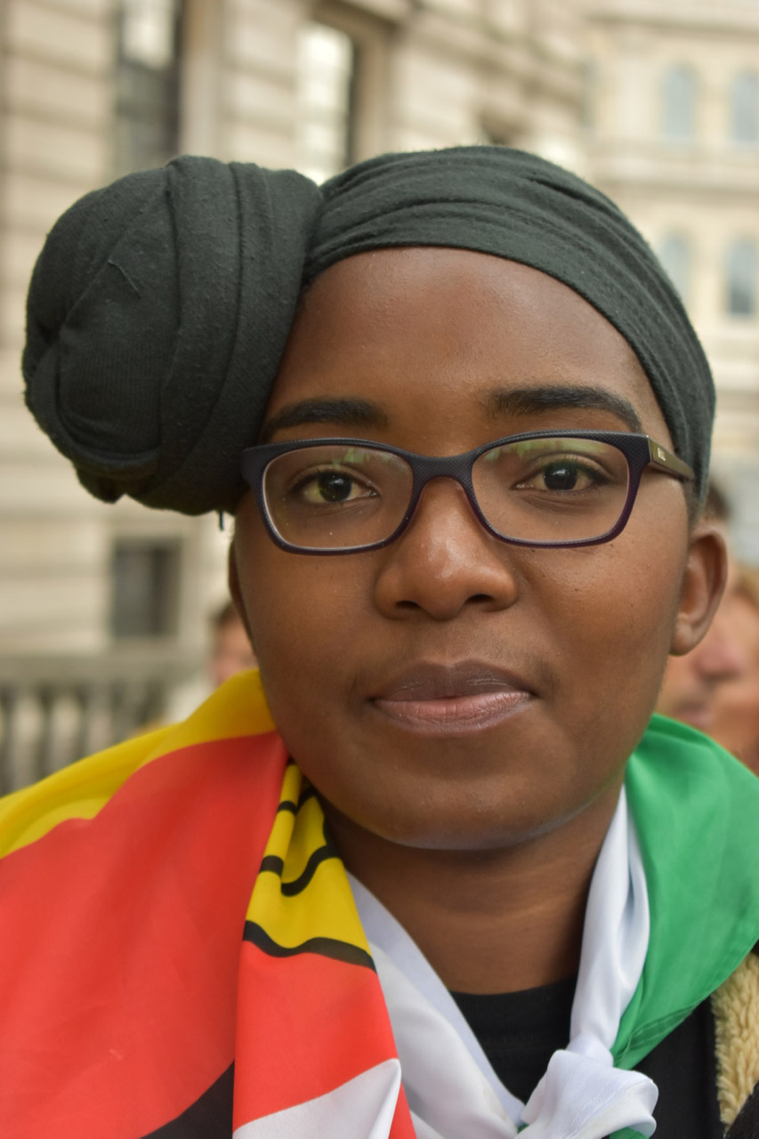 Woman in black headscarf