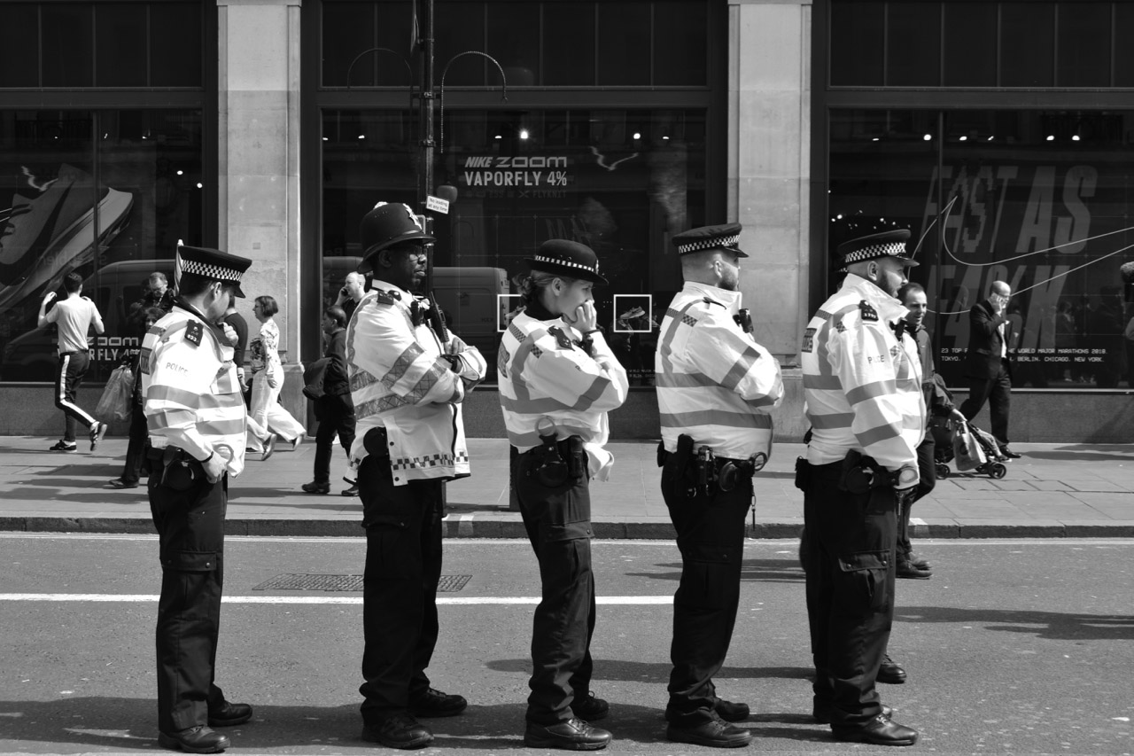 Police lined up in a row.